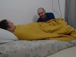 She is sleeping and he wakes her up by rubbing her pussy IV