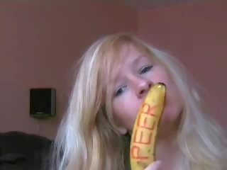 Blonde amateur toying with banana