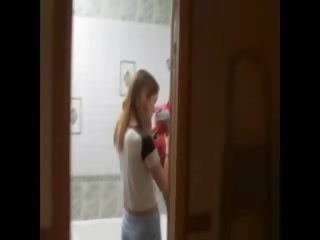 Skinny girl masturbating on the toilet