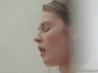 Beautiful teen masturbating in the shower